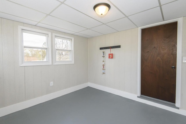 spare room with a drop ceiling