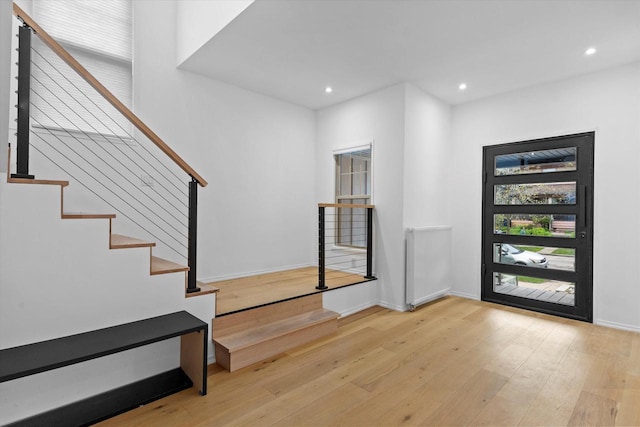 2627 N Farwell Ave, Milwaukee, WI 53211 - entrance foyer with hardwood / wood-style floors, recessed lighting, baseboards, and stairs