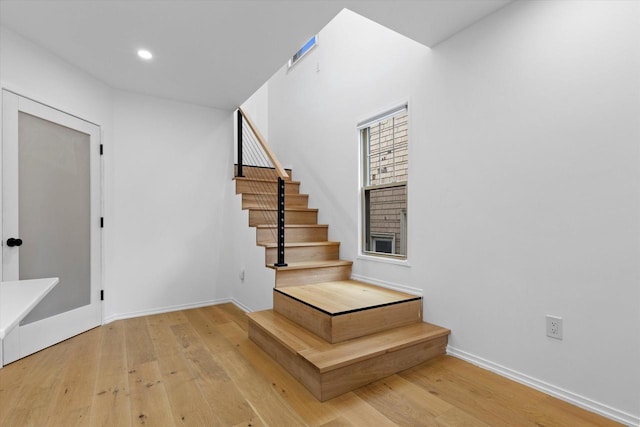 2627 N Farwell Ave, Milwaukee, WI 53211 - staircase featuring hardwood / wood-style floors, recessed lighting, and baseboards