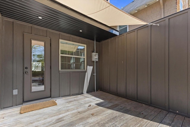 2627 N Farwell Ave, Milwaukee, WI 53211 - view of exterior entry featuring board and batten siding and a deck
