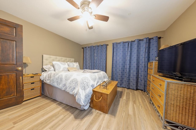 bedroom featuring a ceiling fan and light wood finished floors
