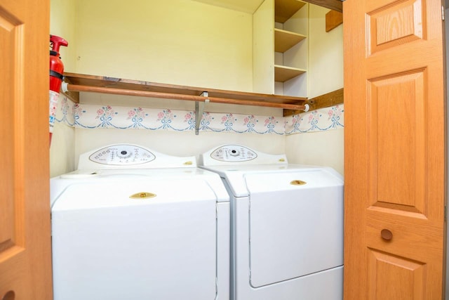 laundry room with laundry area and independent washer and dryer