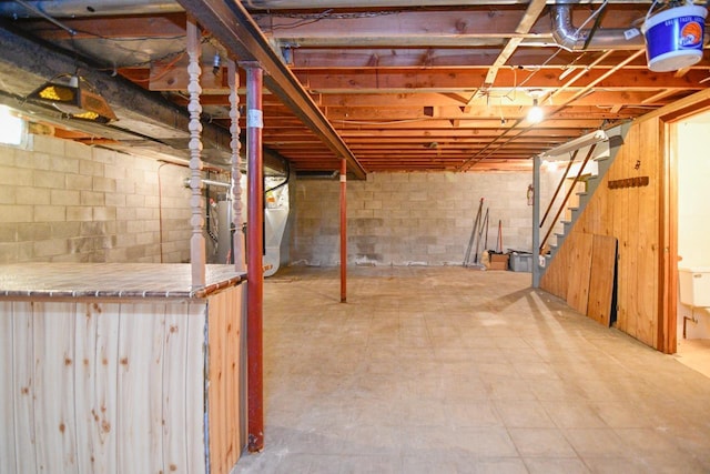 unfinished basement with stairs