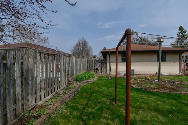 view of yard featuring fence