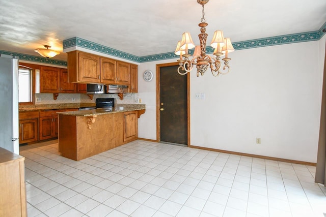 kitchen with a peninsula, a chandelier, brown cabinets, appliances with stainless steel finishes, and decorative light fixtures
