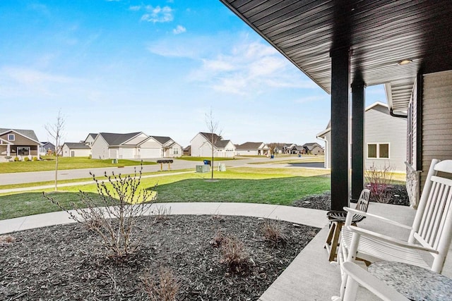 view of patio with a residential view