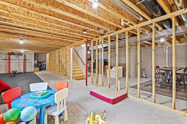 unfinished basement with stairs