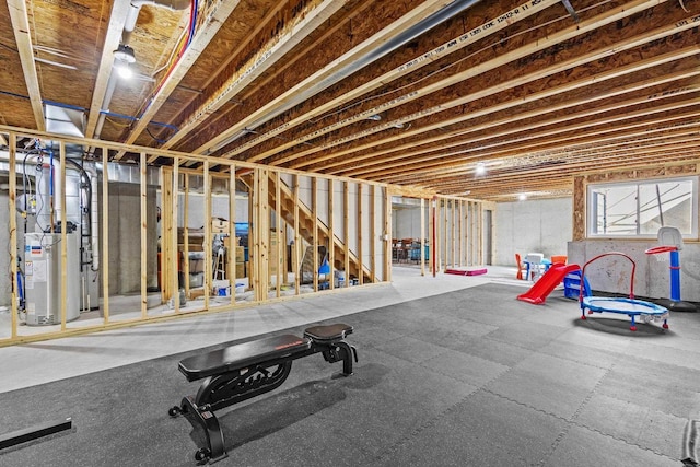 workout room with gas water heater