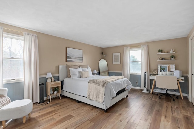 bedroom with light wood-style flooring