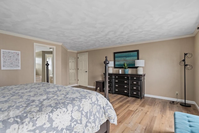 bedroom with crown molding, baseboards, and wood finished floors