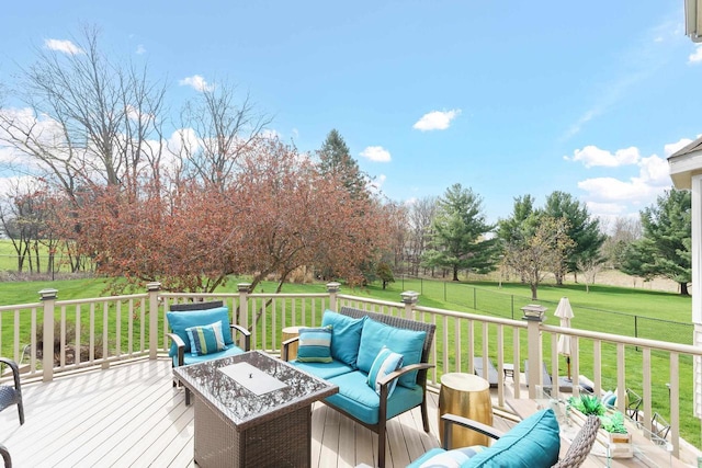 wooden terrace with fence, a yard, and an outdoor hangout area