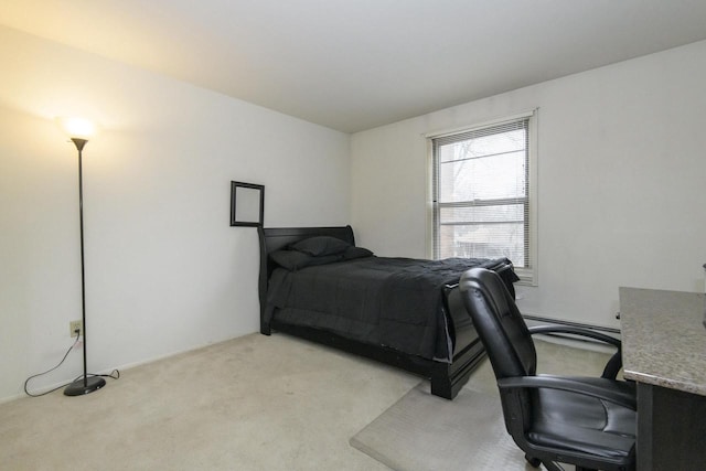 bedroom with light colored carpet