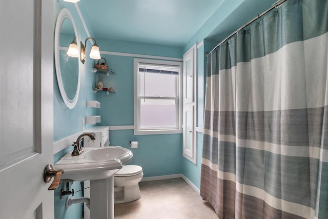 1112 Marquette Ave, Green Bay, WI 54304 - bathroom with toilet, a shower with curtain, and a sink