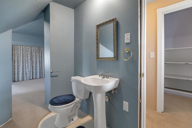 1112 Marquette Ave, Green Bay, WI 54304 - bathroom featuring a sink, curtained shower, and toilet