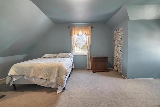 1112 Marquette Ave, Green Bay, WI 54304 - bedroom featuring carpet floors, baseboards, and vaulted ceiling