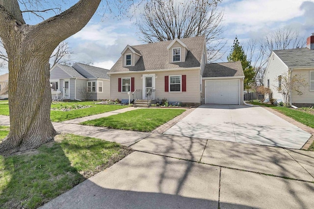 1112 Marquette Ave, Green Bay, WI 54304 - cape cod-style house with a shingled roof, an attached garage, concrete driveway, and a front yard