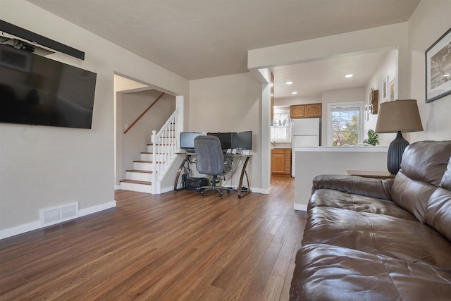 1112 Marquette Ave, Green Bay, WI 54304 - living room featuring hardwood / wood-style floors, stairs, recessed lighting, baseboards, and visible vents