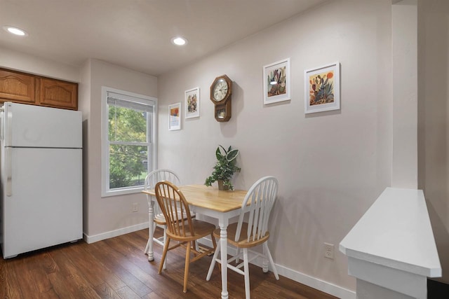 1112 Marquette Ave, Green Bay, WI 54304 - dining space with baseboards, recessed lighting, and dark wood-style flooring