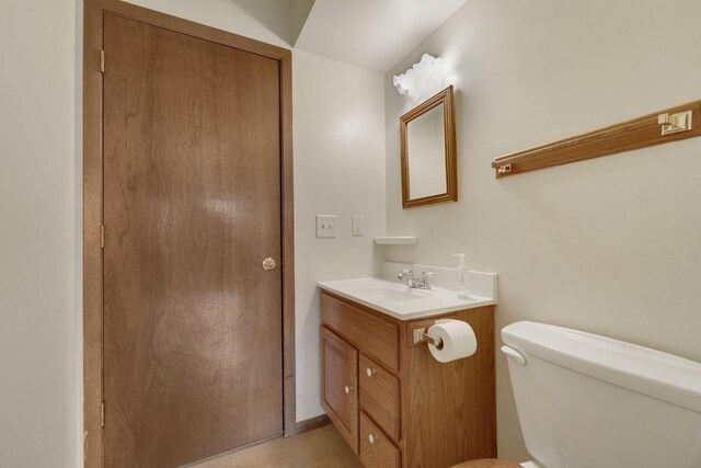 8022 W Glenbrook Rd, Milwaukee, WI 53223 - half bath featuring vanity and toilet