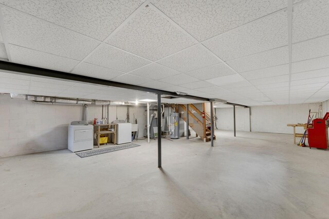 8022 W Glenbrook Rd, Milwaukee, WI 53223 - basement with stairs, washer / dryer, a drop ceiling, and water heater