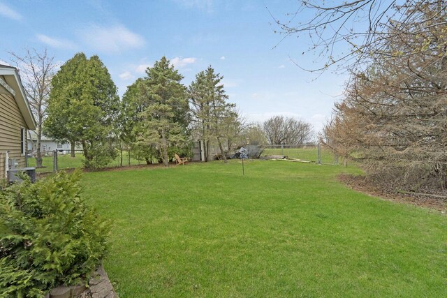 8022 W Glenbrook Rd, Milwaukee, WI 53223 - view of yard with fence