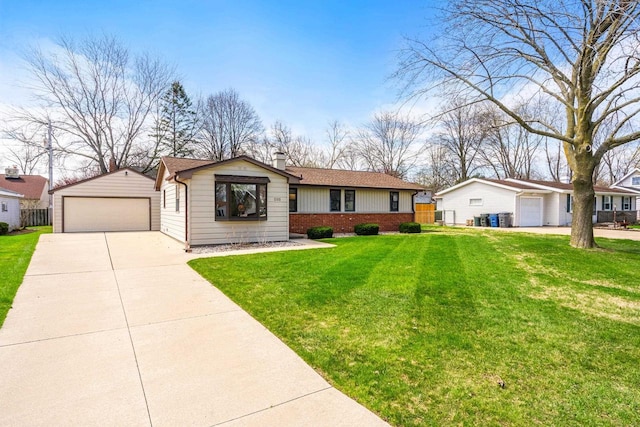 ranch-style house with an outdoor structure, a front yard, brick siding, and a detached garage