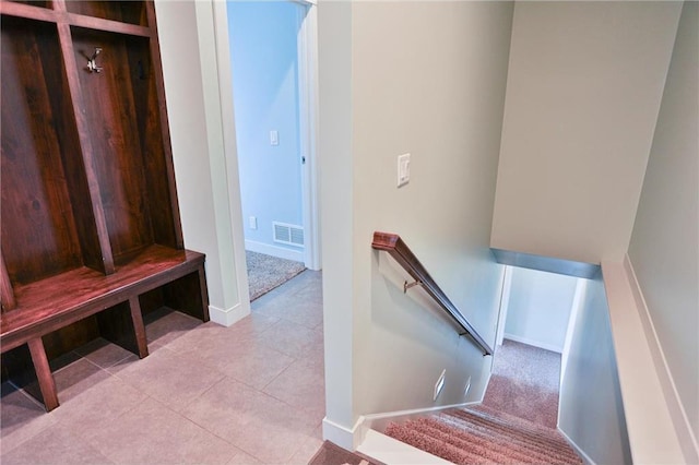 203 Walnut Hill Way, River Falls, WI 54022 - mudroom featuring baseboards and tile patterned flooring