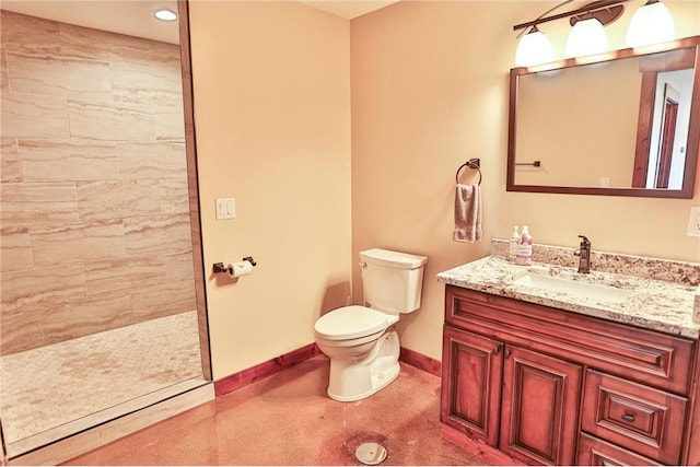 203 Walnut Hill Way, River Falls, WI 54022 - full bath featuring toilet, tiled shower, vanity, baseboards, and recessed lighting