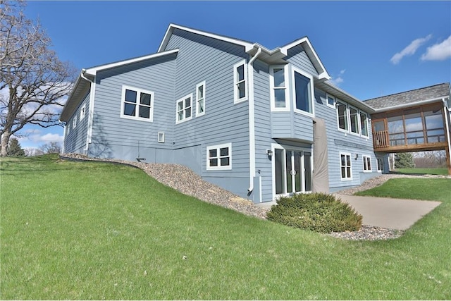 203 Walnut Hill Way, River Falls, WI 54022 - view of home's exterior with a yard and a patio