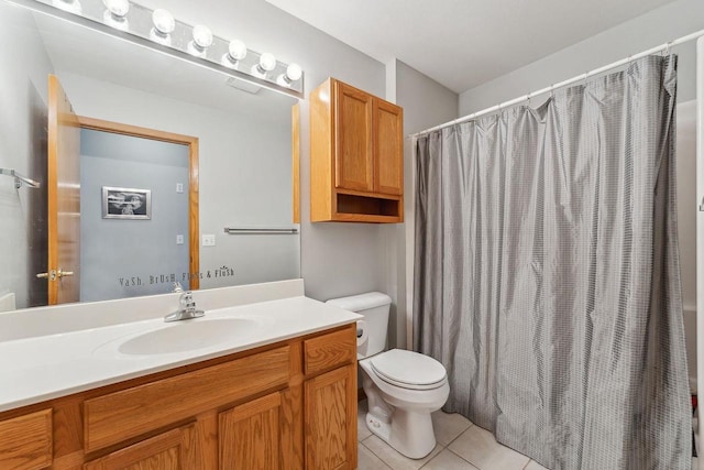 bathroom with vanity, a shower with shower curtain, tile patterned floors, and toilet
