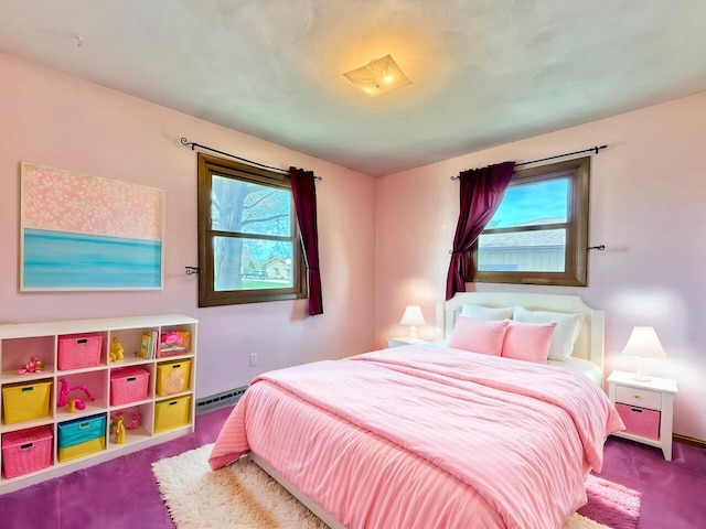 226 Westridge Rd, Janesville, WI 53548 - bedroom with carpet floors, multiple windows, and a baseboard radiator