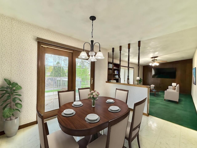 226 Westridge Rd, Janesville, WI 53548 - dining space with baseboards, wallpapered walls, and ceiling fan with notable chandelier