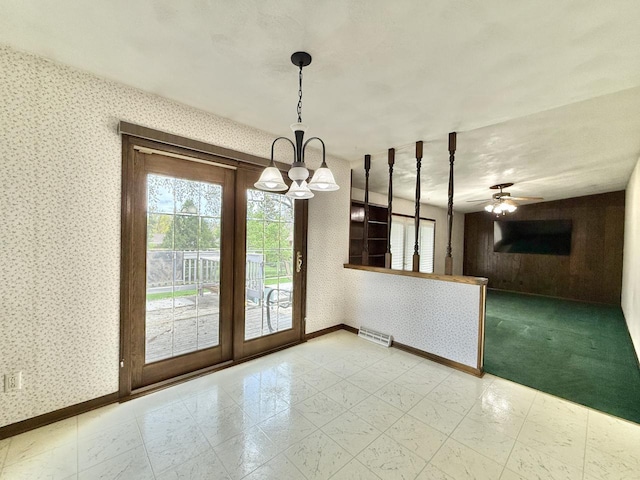226 Westridge Rd, Janesville, WI 53548 - unfurnished dining area featuring baseboards, wallpapered walls, visible vents, and a healthy amount of sunlight