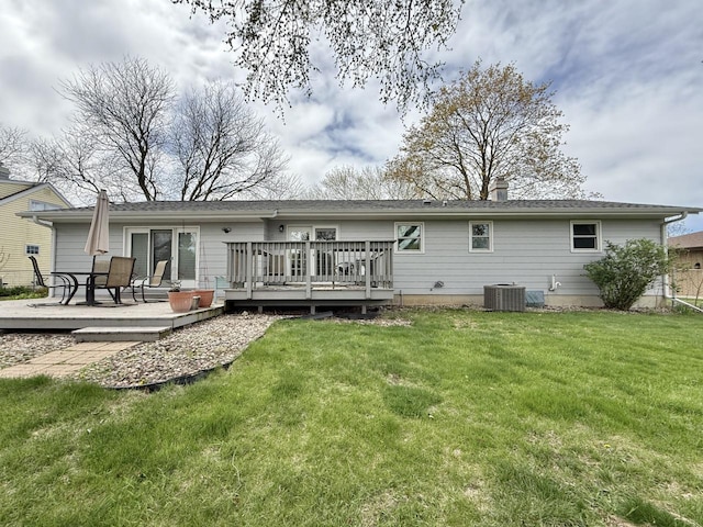 226 Westridge Rd, Janesville, WI 53548 - back of house with a lawn, a wooden deck, and central AC