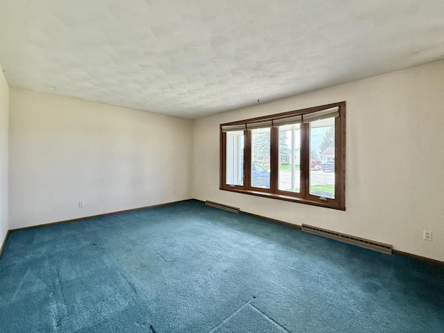 226 Westridge Rd, Janesville, WI 53548 - carpeted spare room with baseboards and baseboard heating