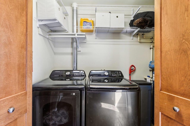 laundry area featuring laundry area and washer and dryer