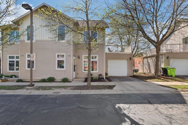 view of front of home featuring a garage and concrete driveway