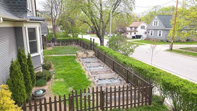 view of yard with fence private yard and a residential view