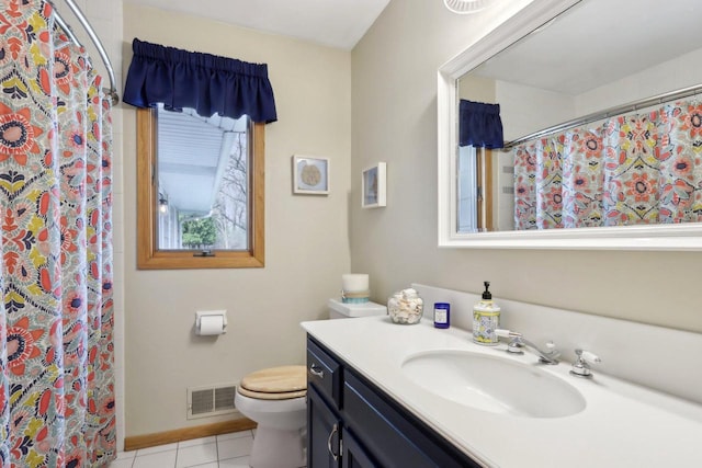 bathroom featuring vanity, toilet, tile patterned floors, a shower with curtain, and visible vents