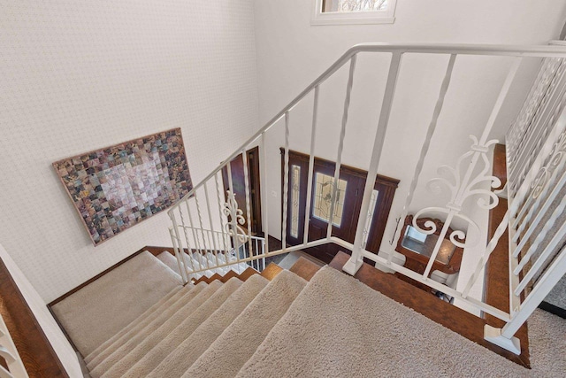 stairway with a high ceiling