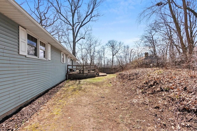 view of yard with a deck