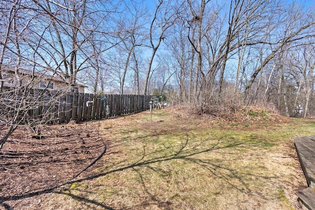 view of yard with fence