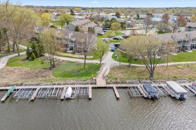 aerial view with a residential view and a water view