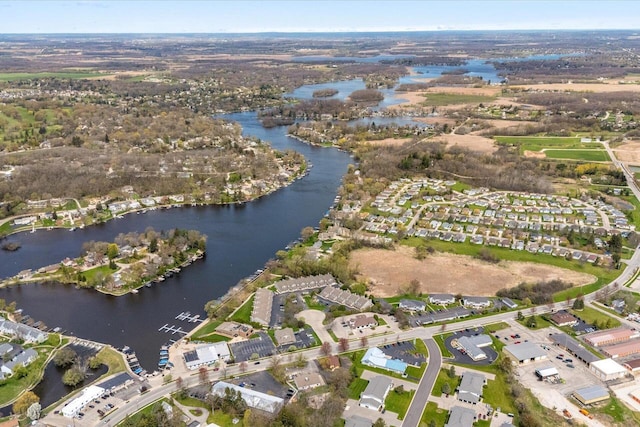 aerial view with a water view and a residential view
