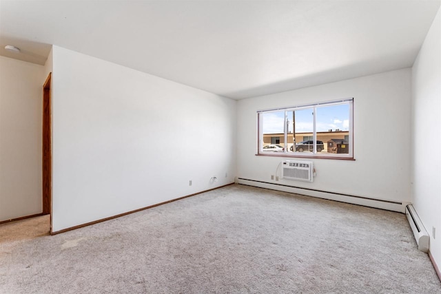 carpeted empty room with baseboards, a baseboard radiator, and an AC wall unit