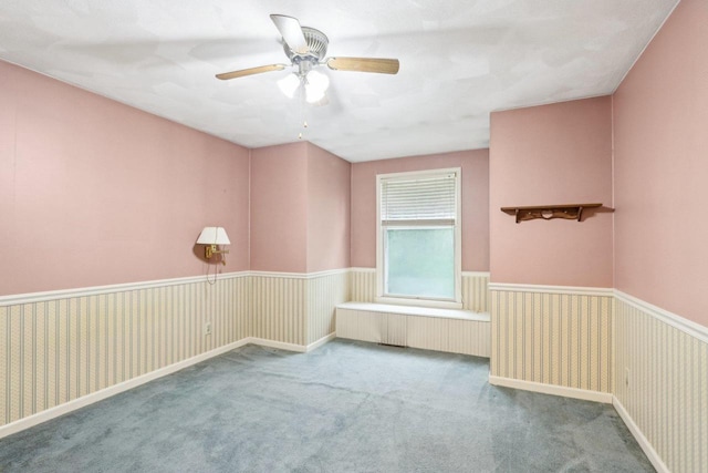 S9073 Timbercrest Trl, Prairie Du Sac, WI 53578 - carpeted empty room featuring ceiling fan and wainscoting