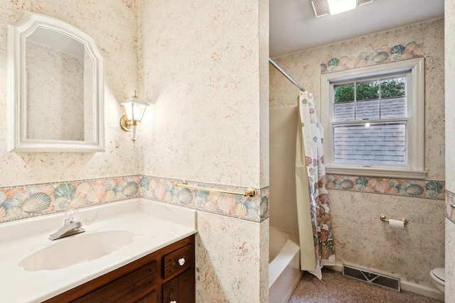 S9073 Timbercrest Trl, Prairie Du Sac, WI 53578 - bathroom featuring vanity, shower / bath combination with curtain, and toilet