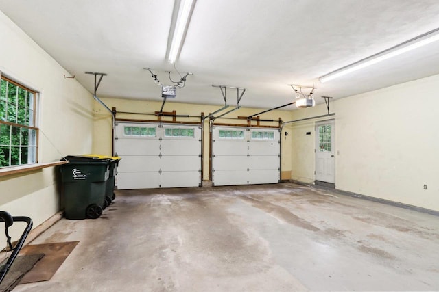 S9073 Timbercrest Trl, Prairie Du Sac, WI 53578 - garage featuring a garage door opener