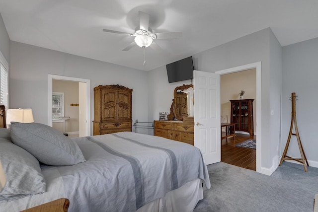 bedroom featuring baseboards, a ceiling fan, and carpet floors