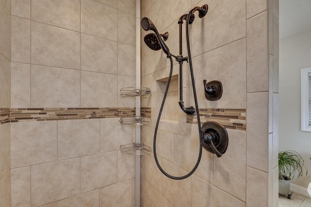 interior details with a tile shower